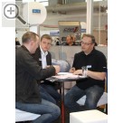 COPARTS Profi Service Tage 2011 Matthias Bscherhoff COPARTS (re.) und Marc Tegge (mi.) SPRINGER bei der gemeinsamen Werkstattplaung mit einem Kunden.  